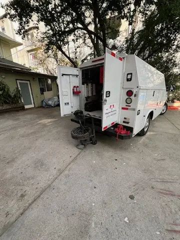 Magnet Plumbing service vehicle on-site for Grease Trap Cleaning in High Point of Delray